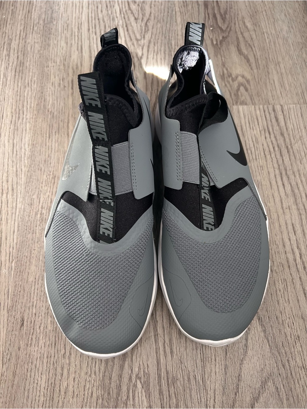 Nike Women’s Slip-On Sneakers in Gray and Black